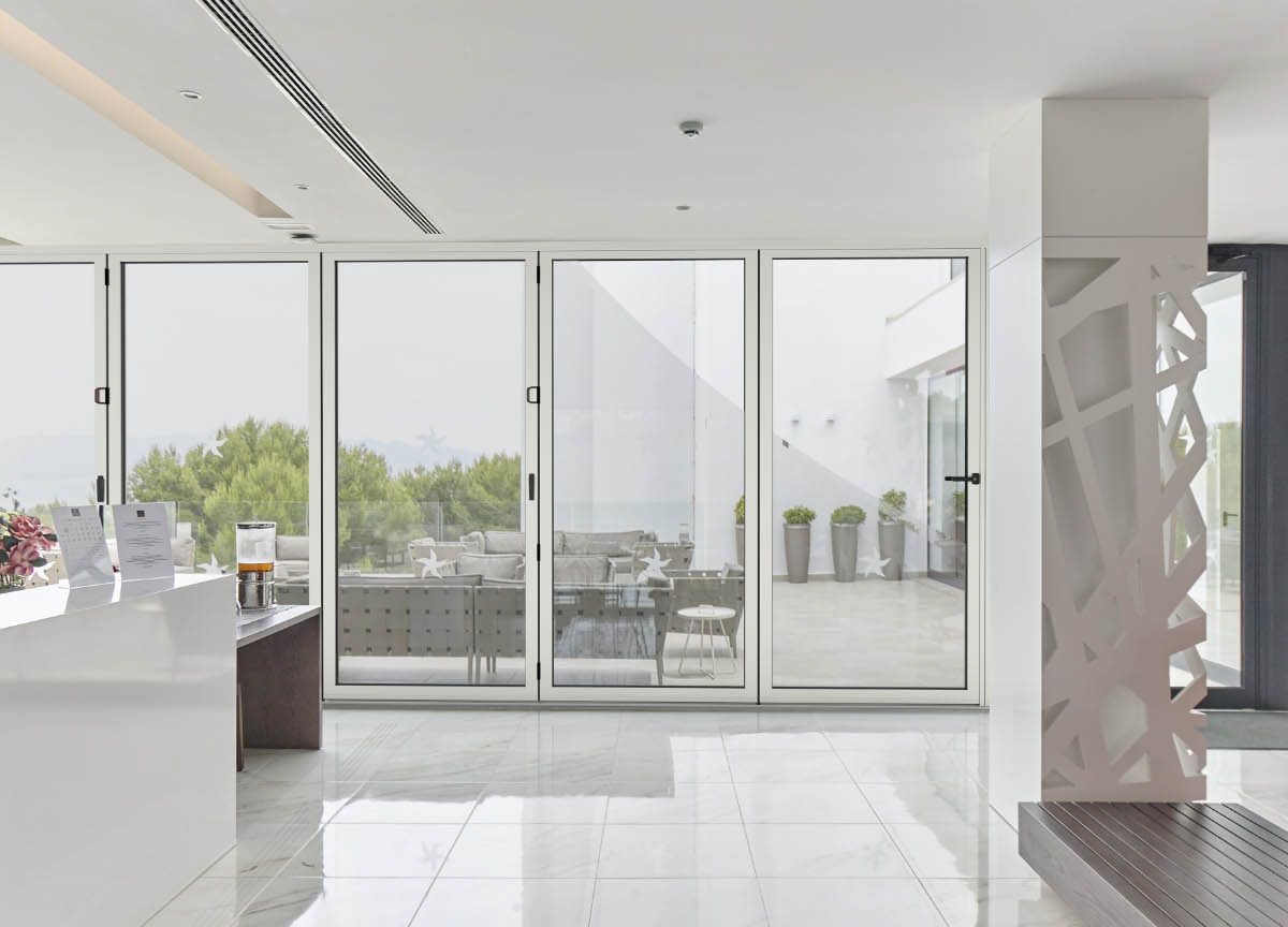 white aluminium bifold doors